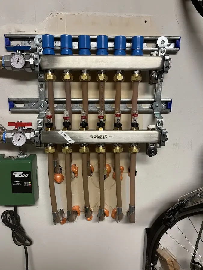 Plumber performing Water Heater Repair at a residential property in Murraysville