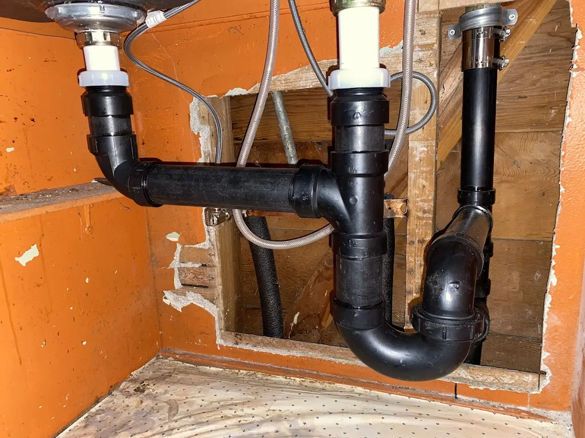 Professional Garbage Disposal Repair equipment and tools on the job in Murraysville